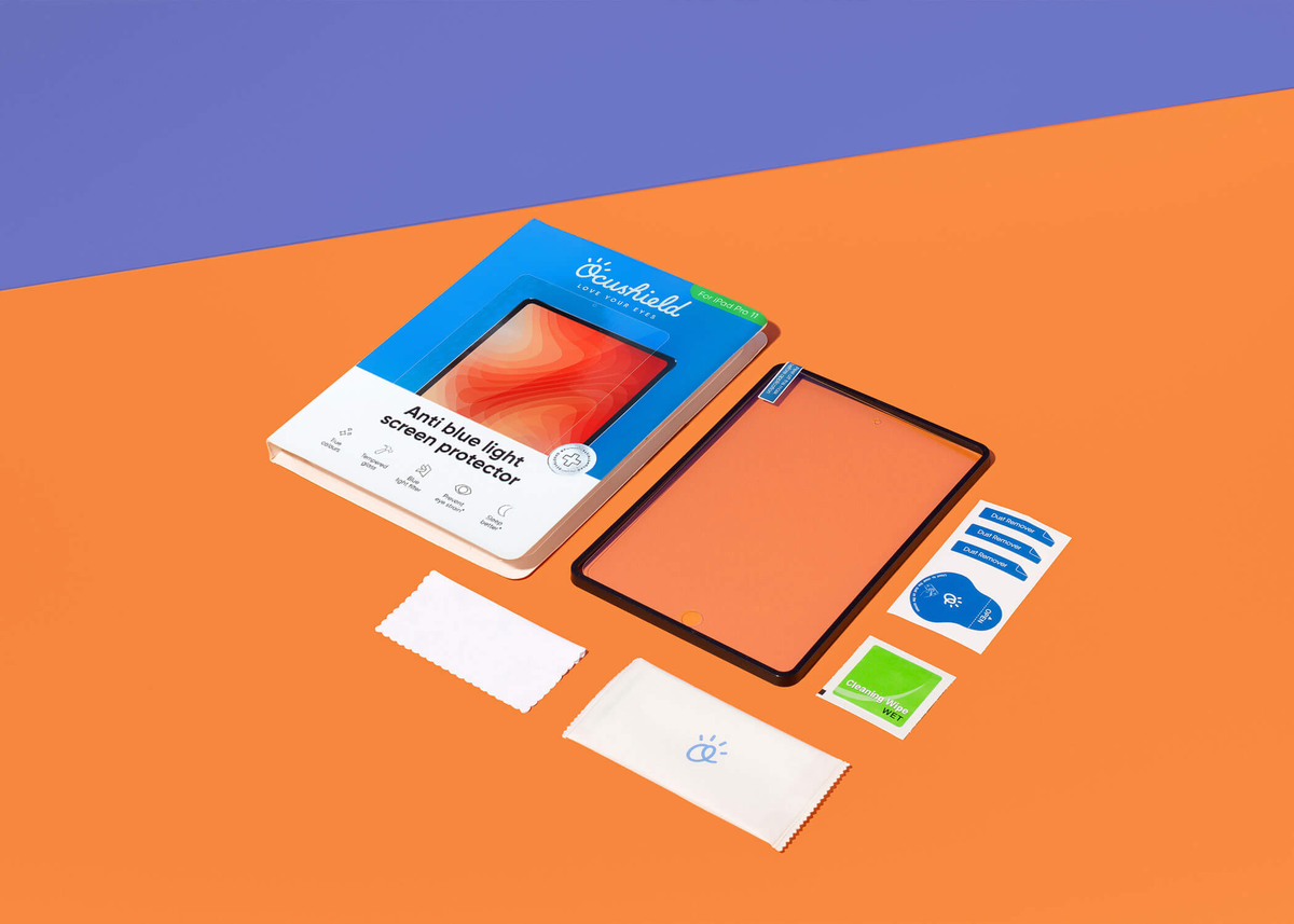 iPad screen protector packaging showcasing anti blue light screen protector, microfibre cloth, dust removers and application tray